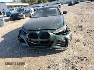 2023 BMW i4 eDrive40 z VIN WBY73AW08PFN49504, wystawiony jako Copart lot #85935954 z przebiegiem Nie podano mil oraz Szkoda całkowita • Salvage title. Historia ofert i sprzedaży dostępna na DreamBid. Obrazek 10.