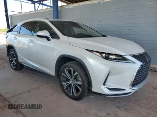 2022 Lexus RX 350 with VIN 2T2HZMAAXNC244996, listed as a Copart auction lot 61692215 with 84,540 mi miles and Salvage title. Bid and sale history available at DreamBid. Image 4.