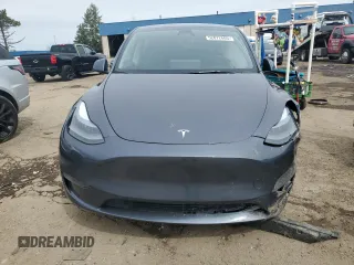 2023 Tesla Model Y Long Range z VIN 7SAYGDEE3PF884220, wystawiony jako Copart lot #52072605 z przebiegiem 44 996 mil mil oraz Czysty tytuł • Clean title. Historia ofert i sprzedaży dostępna na DreamBid. Obrazek 5.