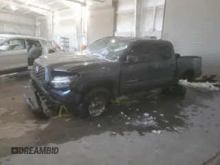 2022 Toyota Tacoma SR with VIN 3TMCZ5AN5NM465310, listed as a Copart auction lot 87764495 with 66,660 mi miles and Salvage title. Bid and sale history available at DreamBid. Image 1.