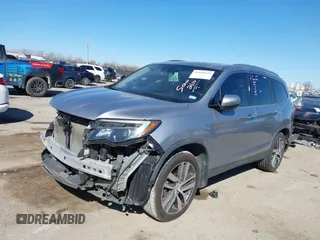 2017 Honda Pilot Touring with VIN 5FNYF5H93HB008088, listed as a IAAI auction lot 41699129 with 110,830 mi miles. Bid and sale history available at carsss.com. Image 17.
