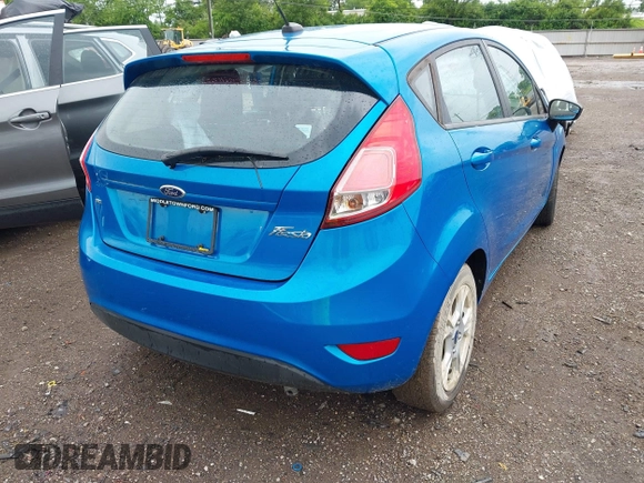 2015 Ford Fiesta SE z VIN 3FADP4EJ9FM133020, wystawiony jako IAAI lot #42302738 z przebiegiem 115 669 mil mil oraz . Historia ofert i sprzedaży dostępna na DreamBid. Obrazek 4.
