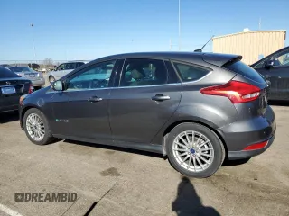 2015 Ford Focus Electric z VIN 1FADP3R49FL211344, wystawiony jako Copart lot #40895604 z przebiegiem 59 815 mil mil oraz . Historia ofert i sprzedaży dostępna na DreamBid. Obrazek 2.