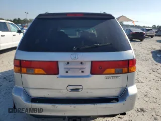2003 Honda Odyssey EX z VIN 5FNRL18673B014271, wystawiony jako Copart lot #68613374 z przebiegiem 236 360 mil mil oraz Nie do naprawy • Non repairable. Historia ofert i sprzedaży dostępna na DreamBid. Obrazek 6.