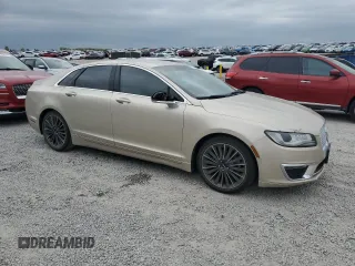 2017 Lincoln MKZ Premiere z VIN 3LN6L5A9XHR637903, wystawiony jako Copart lot #51170425 z przebiegiem 102 218 mil mil oraz Szkoda całkowita • Salvage title. Historia ofert i sprzedaży dostępna na DreamBid. Obrazek 4.