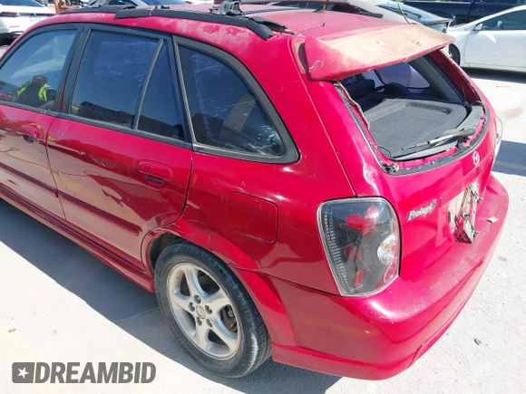 2002 Mazda Protege with VIN JM1BJ246721565634, listed as a IAAI auction lot 41984727 with 235,764 mi miles and . Bid and sale history available at DreamBid. Image 6.