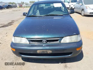 1997 Toyota Corolla with VIN 1NXBA02E3VZ517237, listed as a IAAI auction lot 42772332 with 185,045 mi miles and . Bid and sale history available at DreamBid. Image 6.