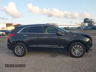 2019 Cadillac XT5 Luxury FWD with VIN 1GYKNCRS6KZ253400, listed as a IAAI auction lot 41984279 with 55,412 mi miles and . Bid and sale history available at DreamBid. Image 13.