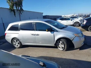 2011 Honda Odyssey Touring with VIN 5FNRL5H9XBB012899, listed as a IAAI auction lot 41611879 with 171,041 mi miles. Bid and sale history available at carsss.com. Image 13.