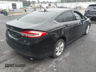 2018 Ford Fusion SE with VIN 3FA6P0H77JR178356, listed as a IAAI auction lot 41970854 with 167,623 mi miles. Bid and sale history available at carsss.com. Image 4.