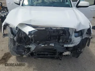 2018 Toyota Tacoma SR5 z VIN 3TMAZ5CN0JM056596, wystawiony jako Copart lot #58373385 z przebiegiem 60 798 mil mil oraz Szkoda całkowita • Salvage title. Historia ofert i sprzedaży dostępna na DreamBid. Obrazek 11.