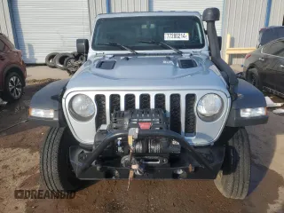 2023 Jeep Gladiator Rubicon FarOut z VIN 1C6JJTBM2PL587711, wystawiony jako Copart lot #77280214 z przebiegiem Nie podano mil oraz Szkoda całkowita • Salvage title. Historia ofert i sprzedaży dostępna na DreamBid. Obrazek 5.