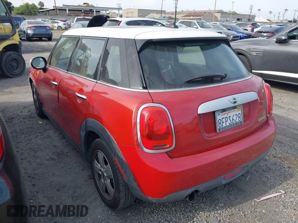 2015 MINI Hardtop 4 Door with VIN WMWXS5C59FT832549, listed as a IAAI auction lot 42106686 with 149,358 mi miles and . Bid and sale history available at DreamBid. Image 3.