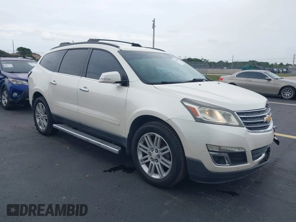 2015 Chevrolet Traverse LT z VIN 1GNKRGKD4FJ137234, wystawiony jako IAAI lot #42655806 z przebiegiem 60 871 mil mil oraz . Historia ofert i sprzedaży dostępna na DreamBid. Obrazek 1.