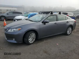 2015 Lexus ES 330 with VIN JTHBK1GGXF2154853, listed as a Copart auction lot 64828665 with 75,119 mi miles and Salvage title. Bid and sale history available at DreamBid. Image 1.