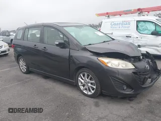 2013 Mazda 5 Grand Touring with VIN JM1CW2DL9D0158077, listed as a IAAI auction lot 42182079 with 153,431 mi miles and . Bid and sale history available at DreamBid. Image 1.