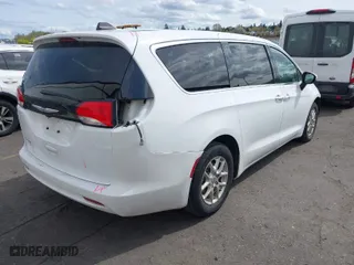 2023 Chrysler Voyager LX with VIN 2C4RC1CG6PR516439, listed as a IAAI auction lot 42007406 with 60,185 mi miles. Bid and sale history available at carsss.com. Image 4.