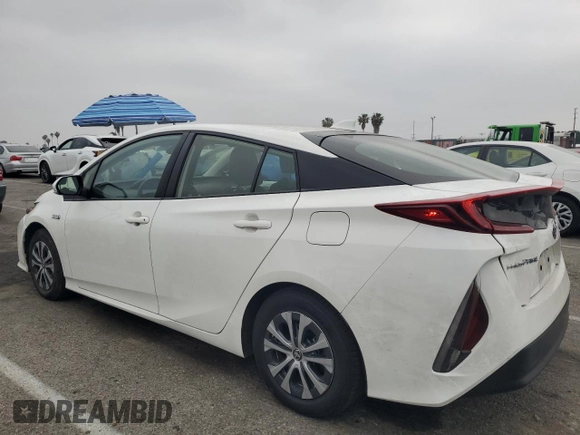 2021 Toyota Prius LE z VIN JTDKAMFP9M3196770, wystawiony jako Copart lot #54309555 z przebiegiem 21 948 mil mil oraz Szkoda całkowita • Salvage title. Historia ofert i sprzedaży dostępna na DreamBid. Obrazek 2.