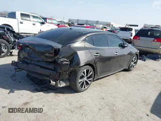 2016 Nissan Maxima Platinum with VIN 1N4AA6AP2GC385723, listed as a IAAI auction lot 41753328 with 162,845 mi miles and . Bid and sale history available at DreamBid. Image 4.