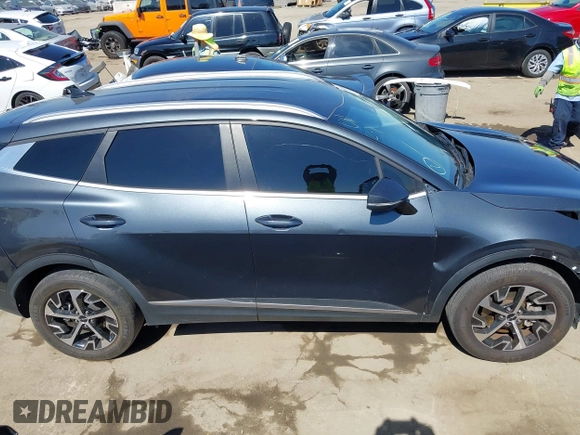 2023 Kia Sportage EX with VIN KNDPVCAG8P7019572, listed as a IAAI auction lot 42226335 with 68,583 mi miles and . Bid and sale history available at DreamBid. Image 14.