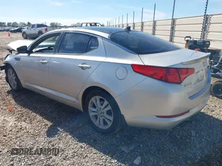 2011 Kia Optima EX with VIN KNAGN4A62B5147448, listed as a IAAI auction lot 41823132 with 219,412 mi miles and . Bid and sale history available at carsss.com. Image 3.