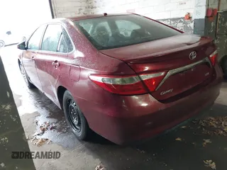 2015 Toyota Camry XLE with VIN 4T1BF1FK8FU932854, listed as a IAAI auction lot 41872099 with Not Provided miles and . Bid and sale history available at DreamBid. Image 3.
