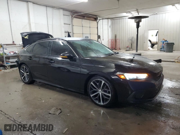 2022 Honda Civic Sedan Touring with VIN 2HGFE1F96NH317163, listed as a Copart auction lot 89190845 with 51,090 mi miles and Salvage Title. Bid and sale history available at carsss.com. Image 4.