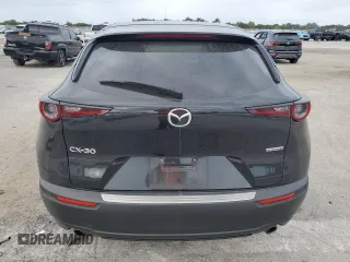 2021 Mazda CX-30 Preferred with VIN 3MVDMACL7MM244487, listed as a Copart auction lot 84307604 with 72,017 mi miles and Salvage Title. Bid and sale history available at DreamBid. Image 6.