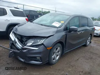 2018 Honda Odyssey EX-L z VIN 5FNRL6H74JB043276, wystawiony jako IAAI lot #42326742 z przebiegiem 126 025 mil mil oraz . Historia ofert i sprzedaży dostępna na DreamBid. Obrazek 2.