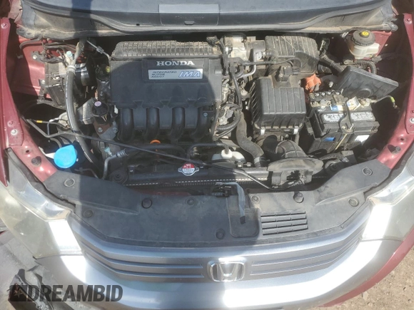 2010 Honda Insight EX with VIN JHMZE2H77AS025567, listed as a Copart auction lot 58499135 with 152,501 mi miles and Salvage title. Bid and sale history available at DreamBid. Image 11.