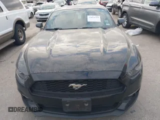 2016 Ford Mustang EcoBoost z VIN 1FA6P8THXG5267039, wystawiony jako IAAI lot #42014319 z przebiegiem 103 936 mil mil oraz . Historia ofert i sprzedaży dostępna na DreamBid. Obrazek 13.
