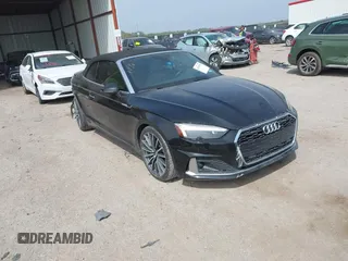 2020 Audi A5 Cabriolet Premium z VIN WAUWNGF50LN000334, wystawiony jako IAAI lot #41919556 z przebiegiem 56 494 mil mil oraz . Historia ofert i sprzedaży dostępna na DreamBid. Obrazek 1.