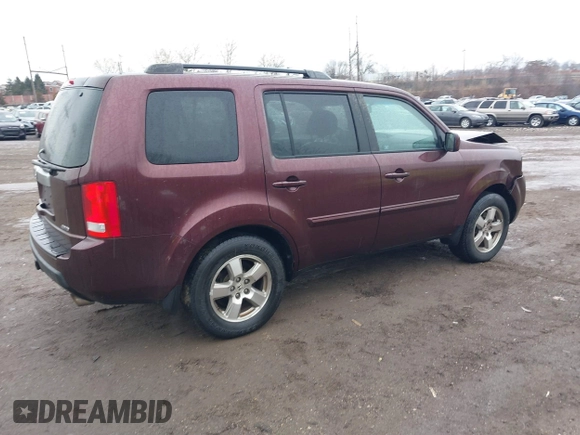 2011 Honda Pilot EX-L with VIN 5FNYF4H61BB091947, listed as a IAAI auction lot 41676585 with 227,751 mi miles and . Bid and sale history available at DreamBid. Image 4.