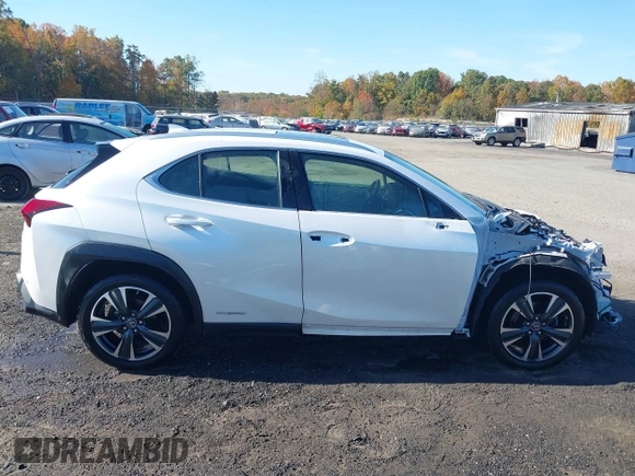 2021 Lexus UX with VIN JTHP9JBH5M2053797, listed as a IAAI auction lot 40718103 with 57,366 mi miles. Bid and sale history available at carsss.com. Image 14.