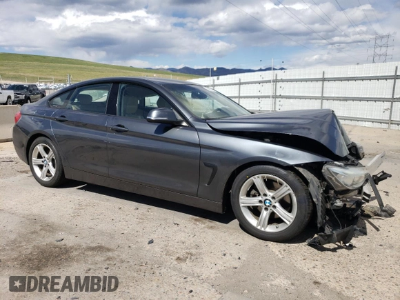 2015 BMW 4 Series 428i z VIN WBA4A5C53FG051038, wystawiony jako Copart lot #54909705 z przebiegiem 101 536 mil mil oraz Nie do naprawy • Non repairable. Historia ofert i sprzedaży dostępna na DreamBid. Obrazek 4.