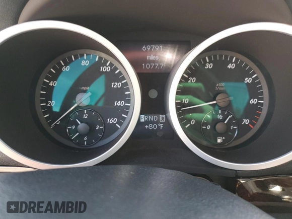 2005 Mercedes-Benz SLK 230/320 with VIN WDBWK56FX5F059587, listed as a Copart auction lot 52400565 with 69,791 mi miles and Salvage title. Bid and sale history available at DreamBid. Image 9.