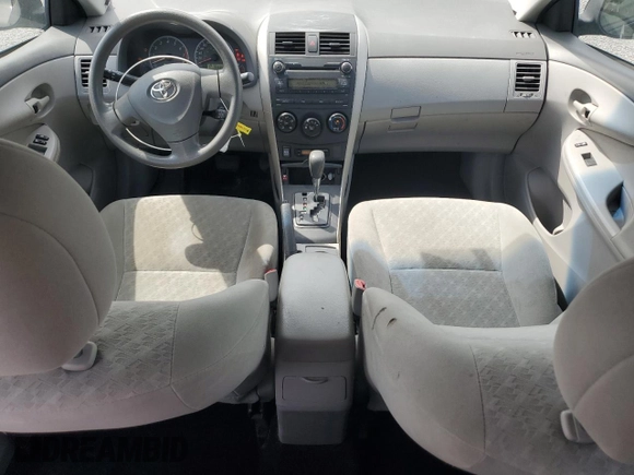 2010 Toyota Corolla z VIN 2T1BU4EE9AC498876, wystawiony jako Copart lot #60984755 z przebiegiem 198 095 mil mil oraz Szkoda całkowita • Salvage title. Historia ofert i sprzedaży dostępna na DreamBid. Obrazek 8.