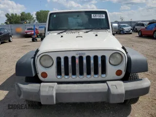 2008 Jeep Wrangler X с VIN 1J4FZ24188L503312, выставлен на аукционе Copart как лот 62013324 с пробегом 174 344 миль миль и Списание • Salvage title. История ставок и продаж доступна на DreamBid. Изображение 5.