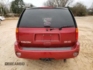 2004 GMC Envoy SLT with VIN 1GKDT13S342262833, listed as a Copart auction lot 87828975 with 203,404 mi miles and Salvage Title. Bid and sale history available at carsss.com. Image 6.