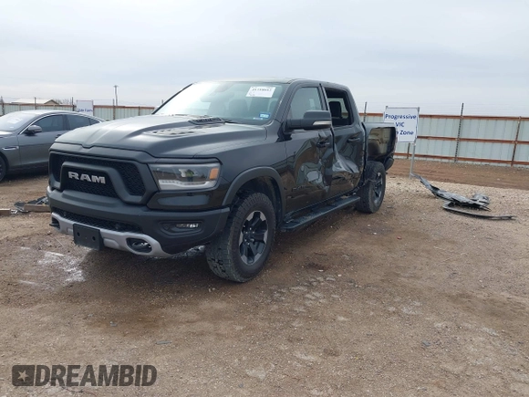 2020 Ram 1500 Rebel with VIN 1C6SRFLT5LN113514, listed as a IAAI auction lot 41718662 with 56,730 mi miles and . Bid and sale history available at DreamBid. Image 17.