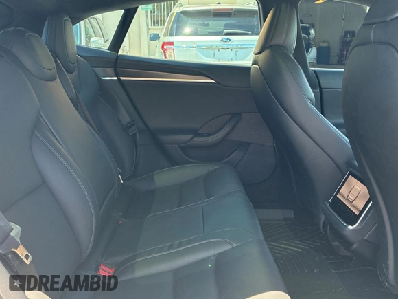 2021 Tesla Model S Plaid с VIN 5YJSA1E64MF447124, выставлен на аукционе Copart как лот 55833265 с пробегом 61 623 миль миль и Чистый • Clean title. История ставок и продаж доступна на DreamBid. Изображение 6.