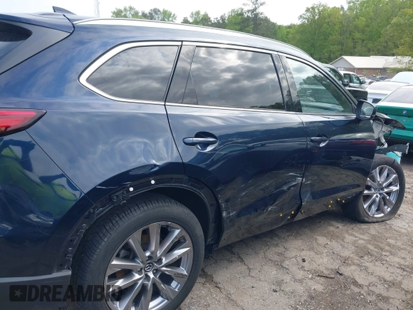 2021 Mazda CX-9 Carbon Edition with VIN JM3TCADY1M0516505, listed as a IAAI auction lot 42016644 with 50,900 mi miles and . Bid and sale history available at carsss.com. Image 6.