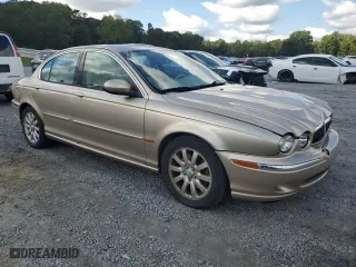2003 Jaguar X-Type 2.5L Manual with VIN SAJEA51D93XD03179, listed as a Copart auction lot 72574844 with 134,414 mi miles and Salvage Title. Bid and sale history available at carsss.com. Image 4.