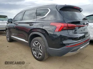 2023 Hyundai Santa Fe Hybrid SEL Premium with VIN 5NMS3DA12PH000154, listed as a Copart auction lot 76742334 with 33,902 mi miles and Salvage Title. Bid and sale history available at carsss.com. Image 2.