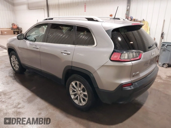 2019 Jeep Cherokee Latitude z VIN 1C4PJMCB0KD122398, wystawiony jako IAAI lot #41798728 z przebiegiem 117 810 mil mil oraz . Historia ofert i sprzedaży dostępna na DreamBid. Obrazek 3.