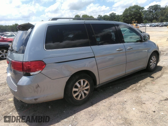 2010 Honda Odyssey EX-L z VIN 5FNRL3H74AB104446, wystawiony jako IAAI lot #42765331 z przebiegiem 319 510 mil mil oraz . Historia ofert i sprzedaży dostępna na DreamBid. Obrazek 4.