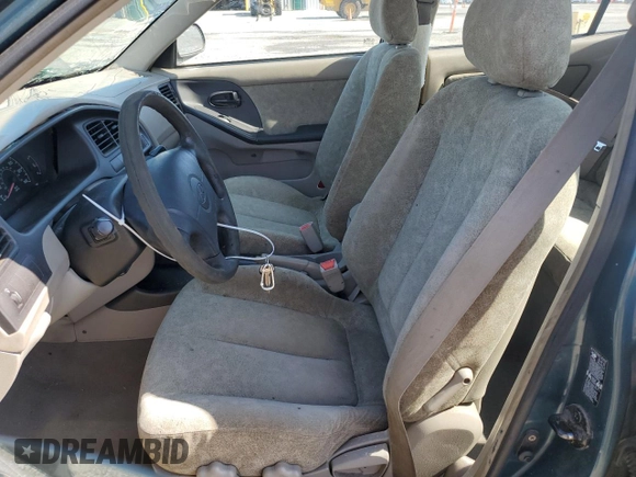2001 Hyundai Elantra GLS with VIN KMHDN45D21U109684, listed as a Copart auction lot 51888855 with 174,105 mi miles and Salvage title. Bid and sale history available at DreamBid. Image 7.