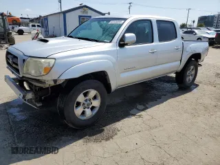 2006 Toyota Tacoma PreRunner with VIN 3TMJU62N46M010315, listed as a Copart auction lot 55530595 with 248,990 mi miles and Salvage title. Bid and sale history available at DreamBid. Image 1.