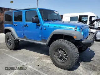 2015 Jeep Wrangler Unlimited Rubicon с VIN 1C4BJWFG9FL591529, выставлен на аукционе Copart как лот 58721265 с пробегом 110 373 миль миль и Чистый • Clean title. История ставок и продаж доступна на DreamBid. Изображение 4.