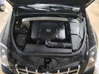 2014 Cadillac CTS Performance z VIN 1G6DG1E37E0103321, wystawiony jako Copart lot #52013005 z przebiegiem 70 394 mil mil oraz Szkody całkowita. Historia ofert i sprzedaży dostępna na DreamBid. Obrazek 11.